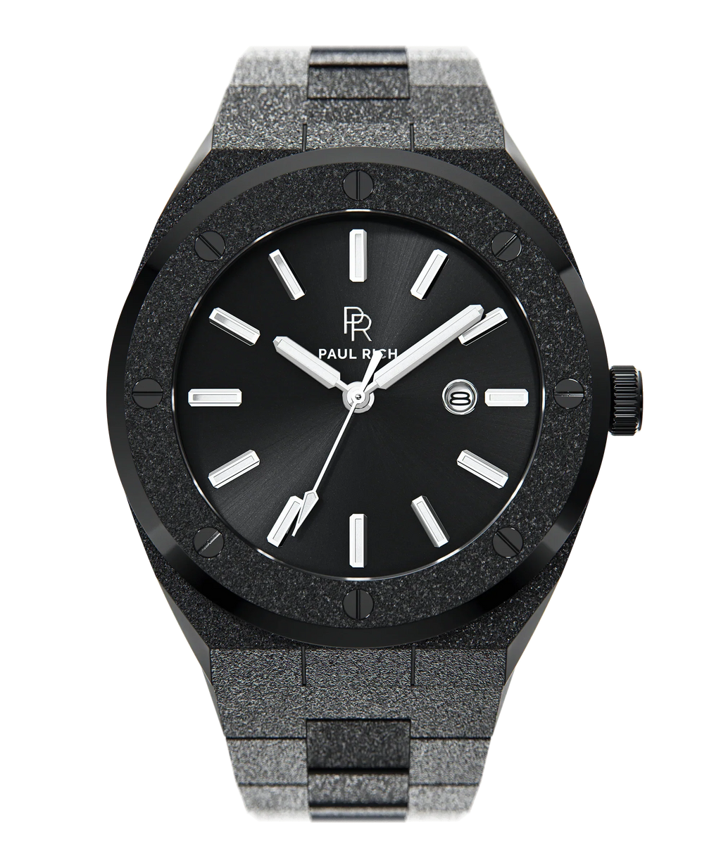 Front view of Paul Rich frosted black watch with sunray black dial, silver markers, and date window, shown on transparent background.