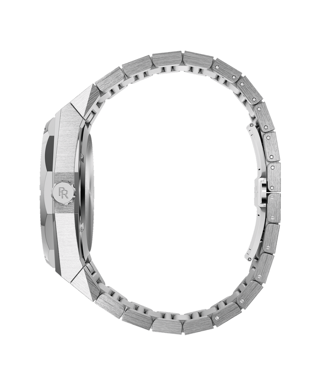 Side view of a Paul Rich watch with brushed silver case, engraved crown, and fully closed silver link bracelet.