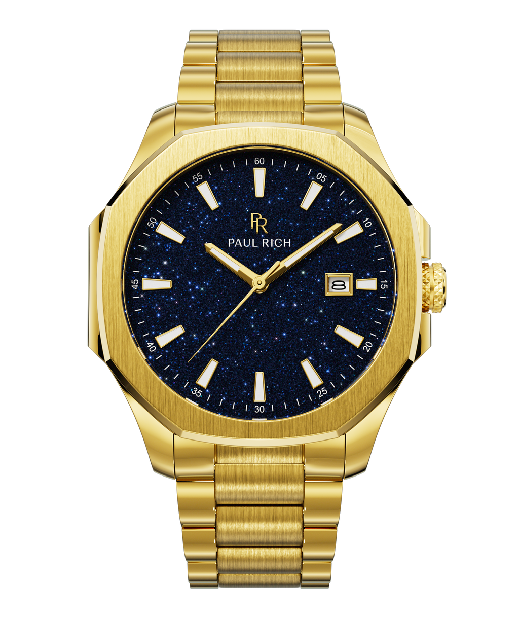 Front view of Paul Rich watch with brushed gold case and bracelet, deep blue aventurine dial, gold indices, and date window at 3 o’clock.