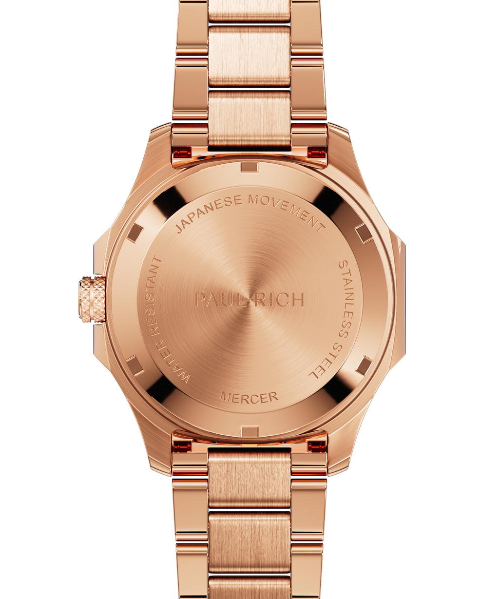Back view of Paul Rich watch with brushed rose gold caseback engraved with “PAUL RICH,” “MERCER,” “JAPANESE MOVEMENT,” and “STAINLESS STEEL.”