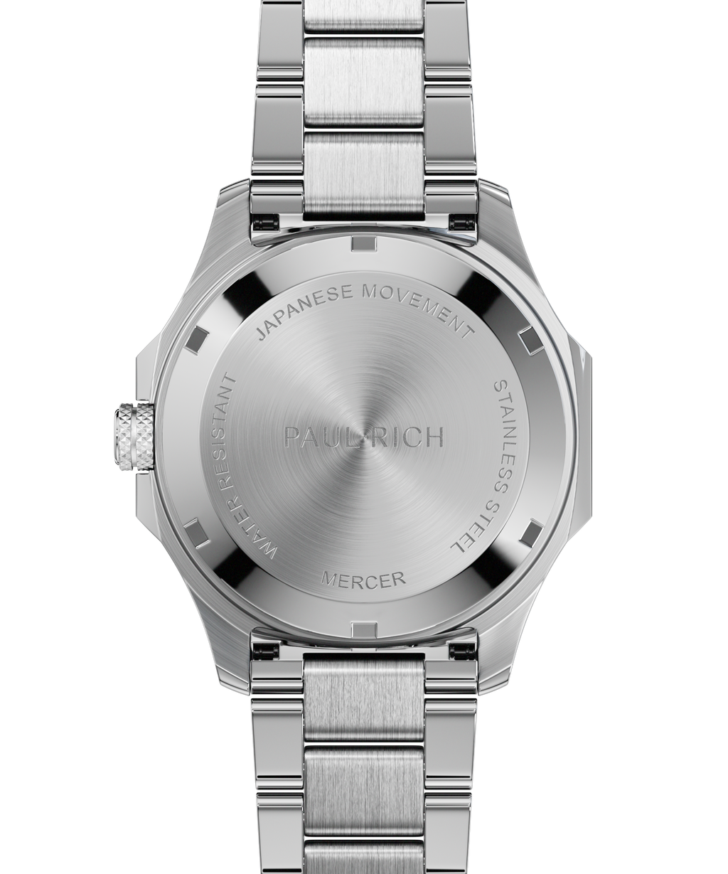 Back view of Paul Rich watch with brushed silver caseback engraved with "PAUL RICH", "MERCER", "JAPANESE MOVEMENT", and "STAINLESS STEEL".