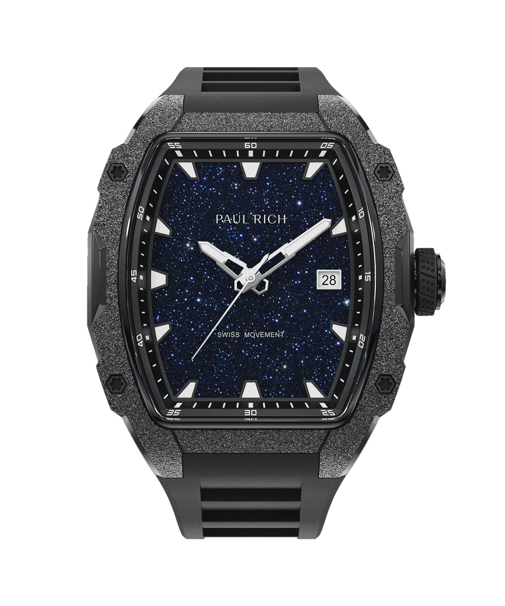 Front view of tonneau-shaped Paul Rich watch with blue aventurine dial, black frosted bezel, date display, and black rubber strap.
