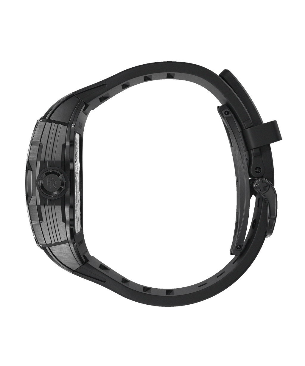 Side view of Paul Rich watch showing black case with frosted bezel, PR monogram crown, and curved black rubber strap.