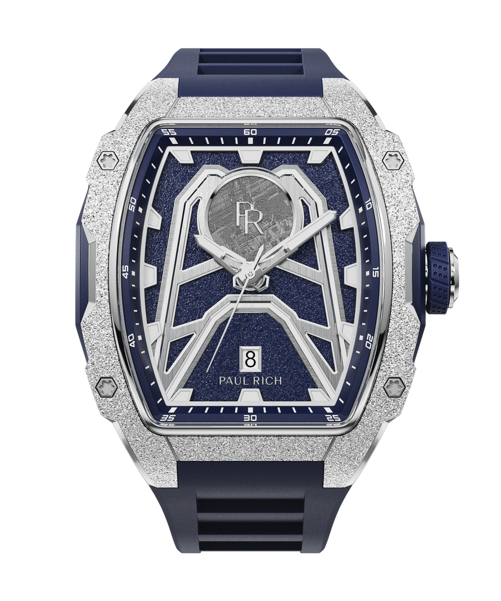 Paul Rich tonneau-shaped watch with frosted silver bezel, navy strap, aventurine dial, central meteorite inlay, and date window at 6.