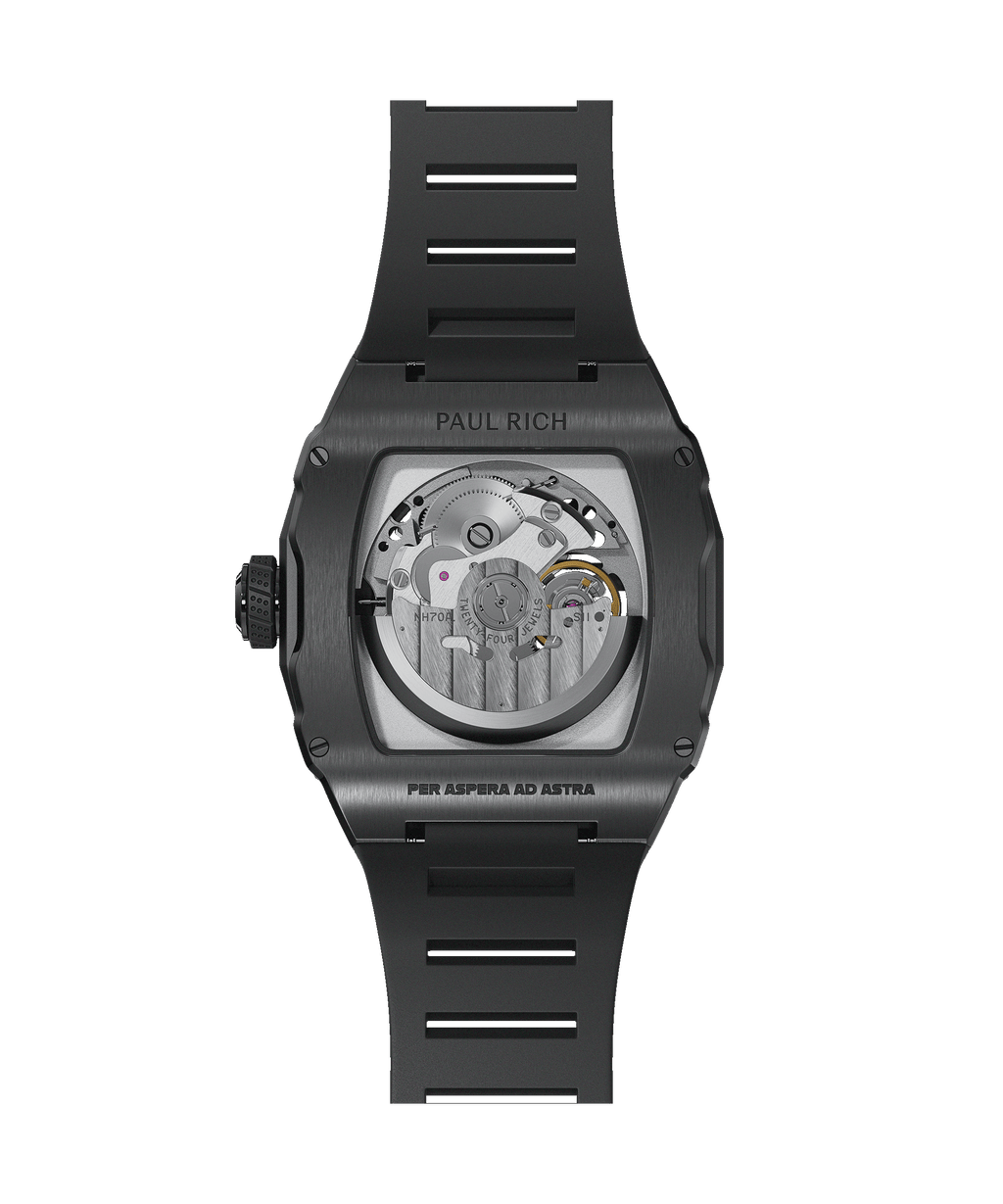 Back view of Paul Rich watch with brushed black case, exposed automatic movement, and 'Per Aspera Ad Astra' engraving on the caseback.
