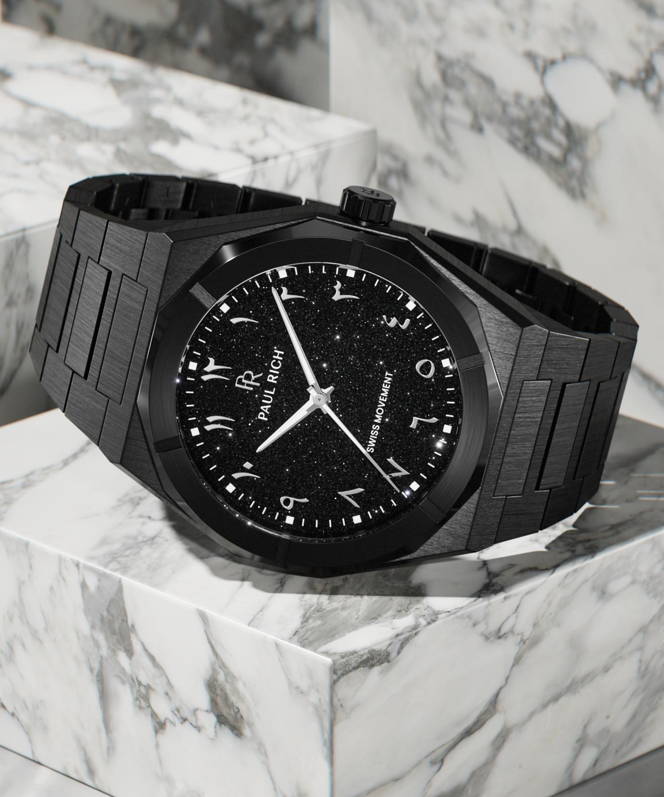 Paul Rich black brushed watch with black aventurine dial, silver Eastern Arabic numerals, and Swiss movement on black bracelet.