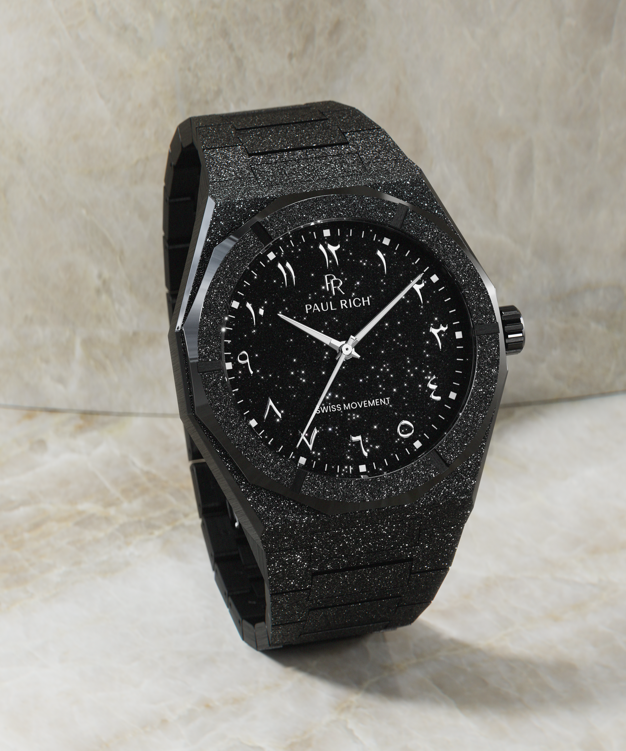Paul Rich black frosted watch with black aventurine dial, silver Eastern Arabic numerals, and Swiss movement, standing upright on marble.