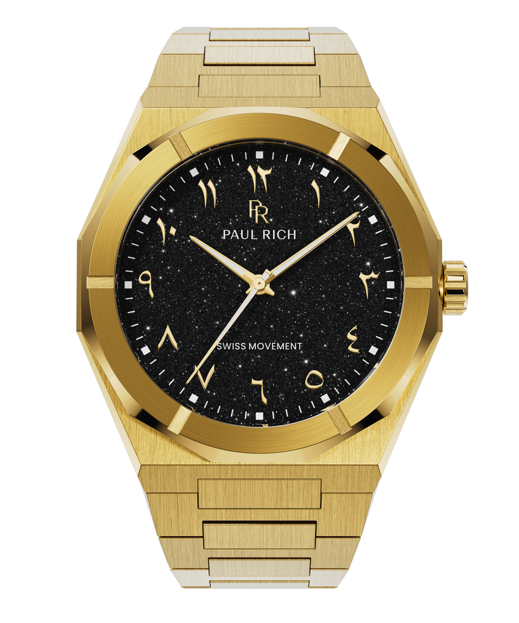Gold watch with brushed case, black aventurine dial, and Arabic numerals, shown on a transparent background.