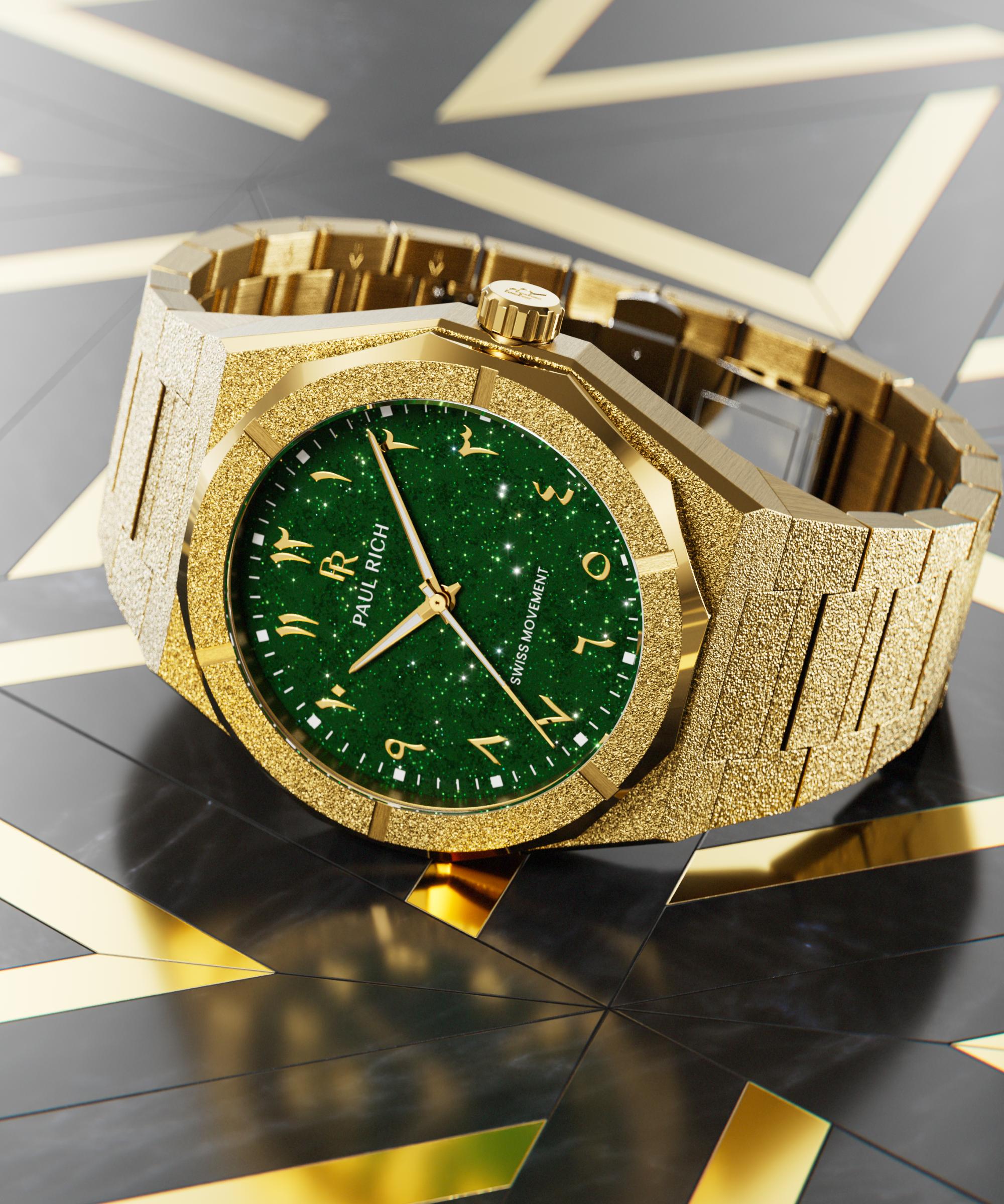 Paul Rich watch with frosted gold case and green aventurine dial with Arabic numerals, displayed on a black and gold geometric surface.
