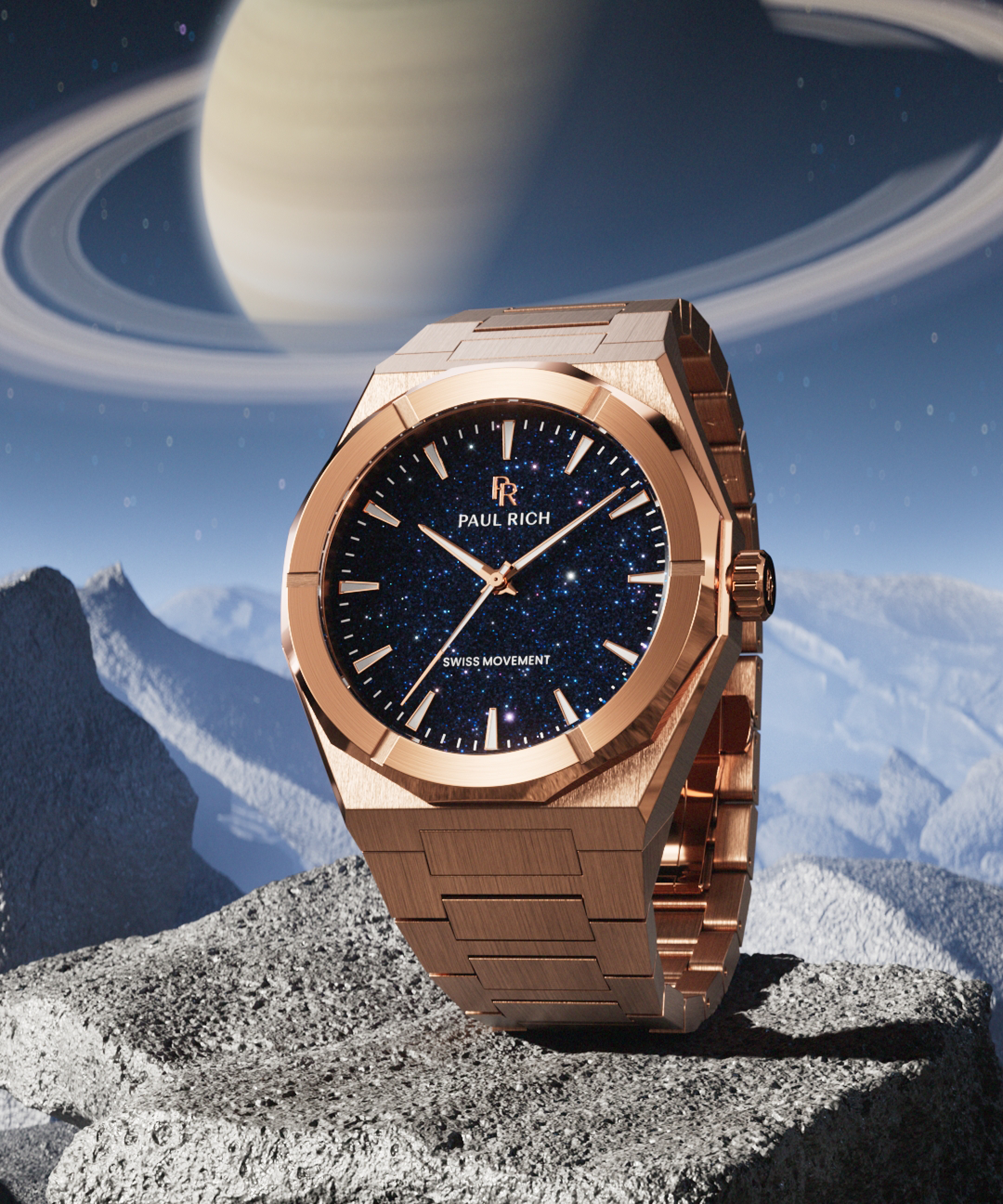 Rose gold Paul Rich watch with blue aventurine dial displayed on rocky terrain, with Saturn and its rings in the starry sky background.