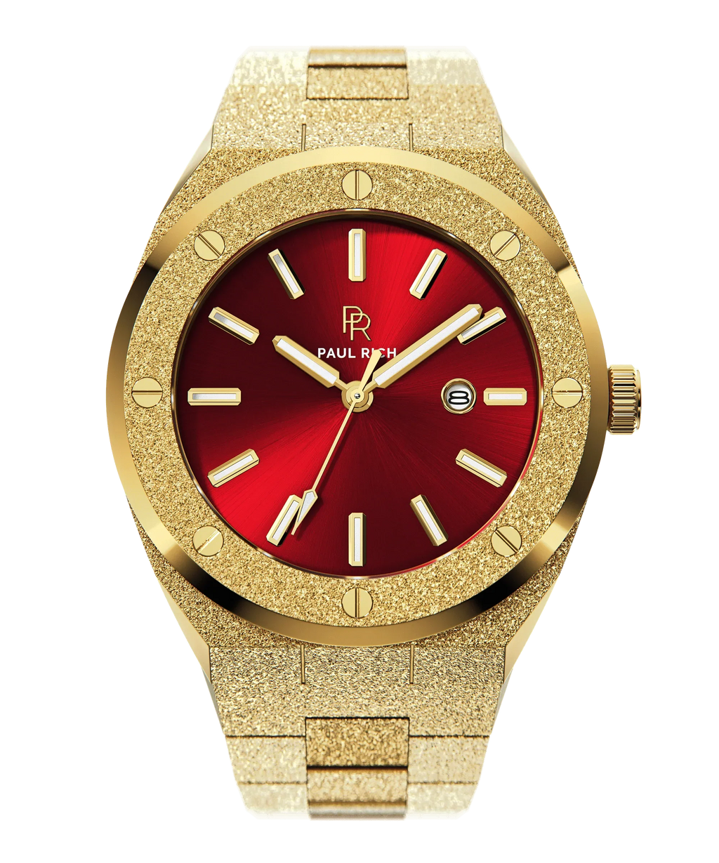 Paul Rich watch with round frosted gold case and bracelet, metallic red sunray dial, gold hour markers, and date window, shown on transparent background.