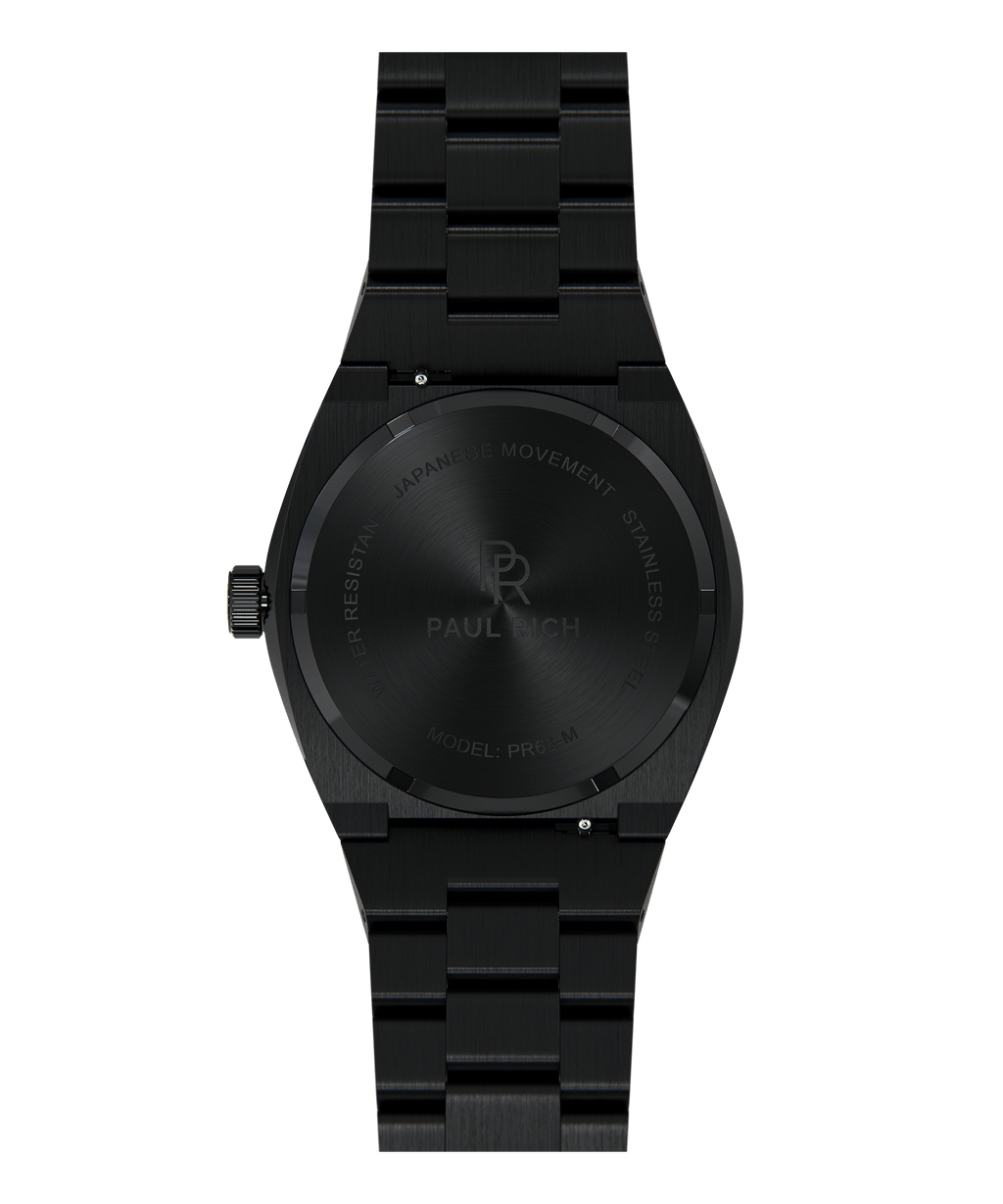 Back view of Paul Rich brushed black watch with engraved case back showing logo, model PR68-M, and Japanese movement.