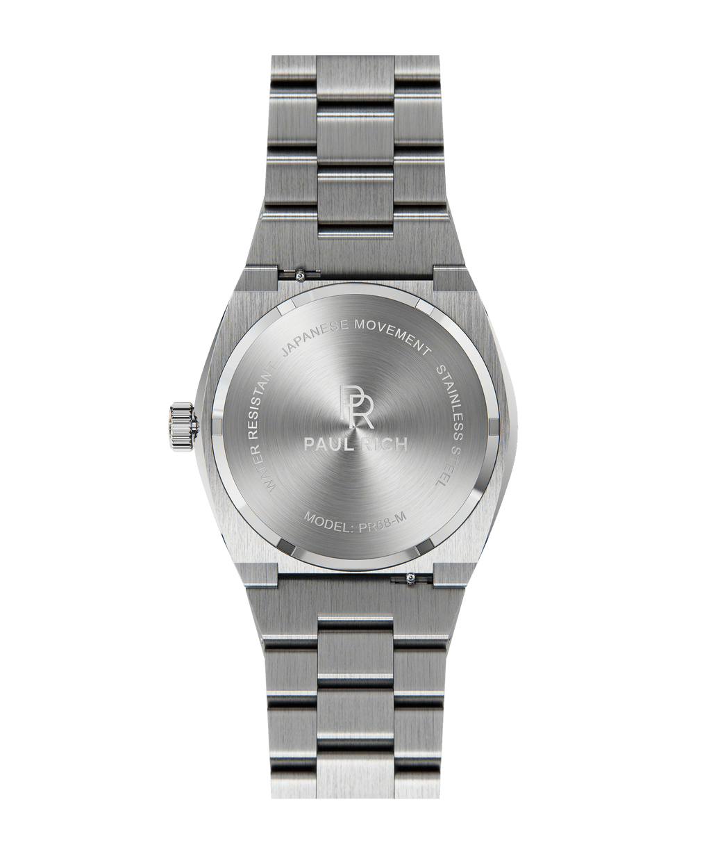 Back view of Paul Rich brushed silver watch with engraved case back showing logo, model PR68-M, and Japanese movement.