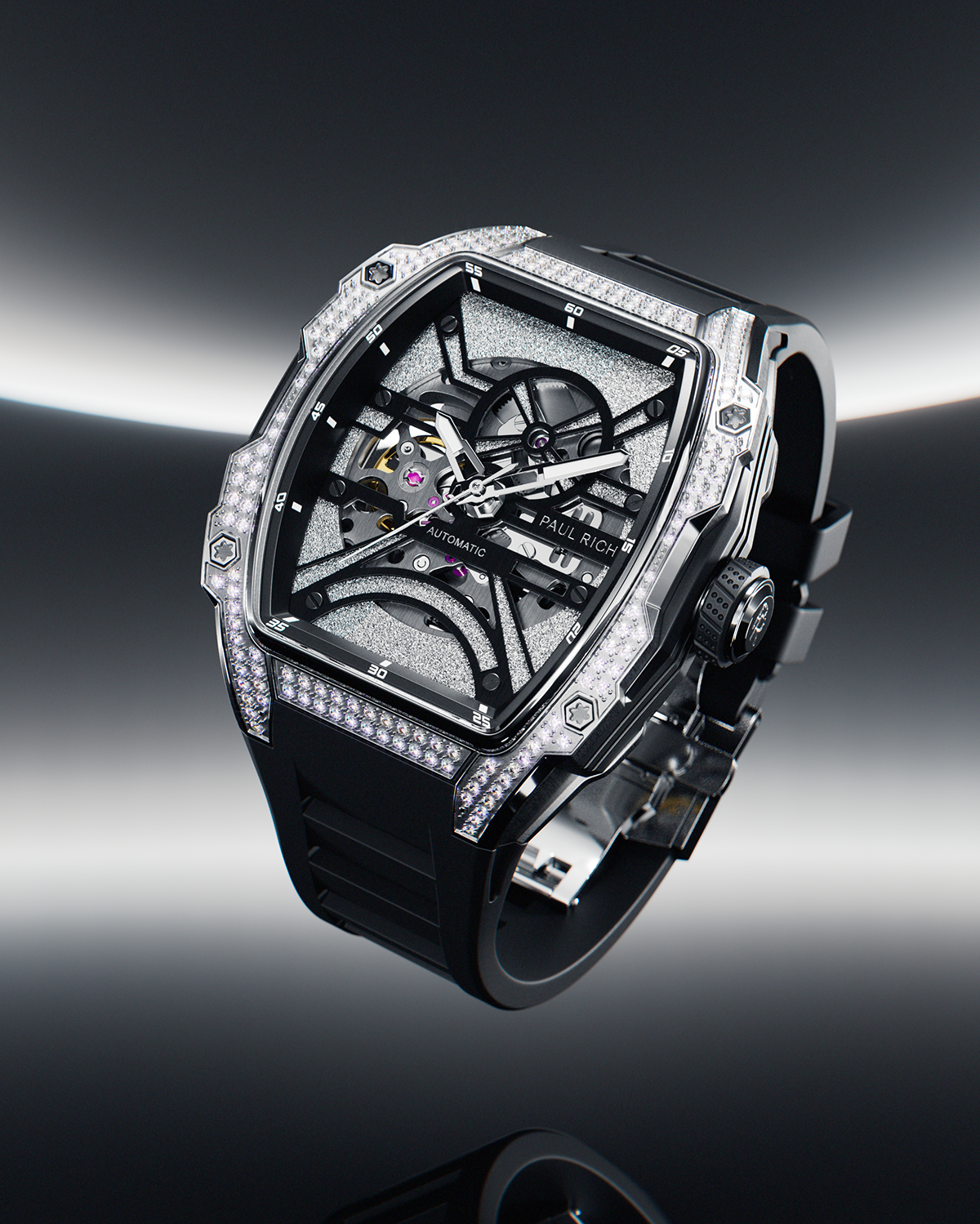 Tonneau-shaped wristwatch with skeleton dial, crystal-set bezel, and black rubber strap displayed on a reflective surface with a dark gradient background.