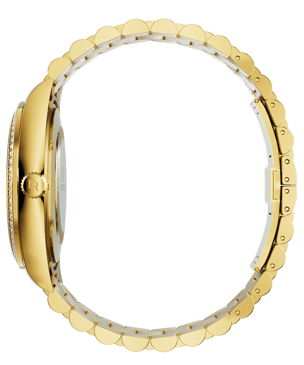 Side view of a gold-tone Paul Rich watch with gem-set bezel, engraved crown, and fully closed gold link bracelet, displayed in a circular position.