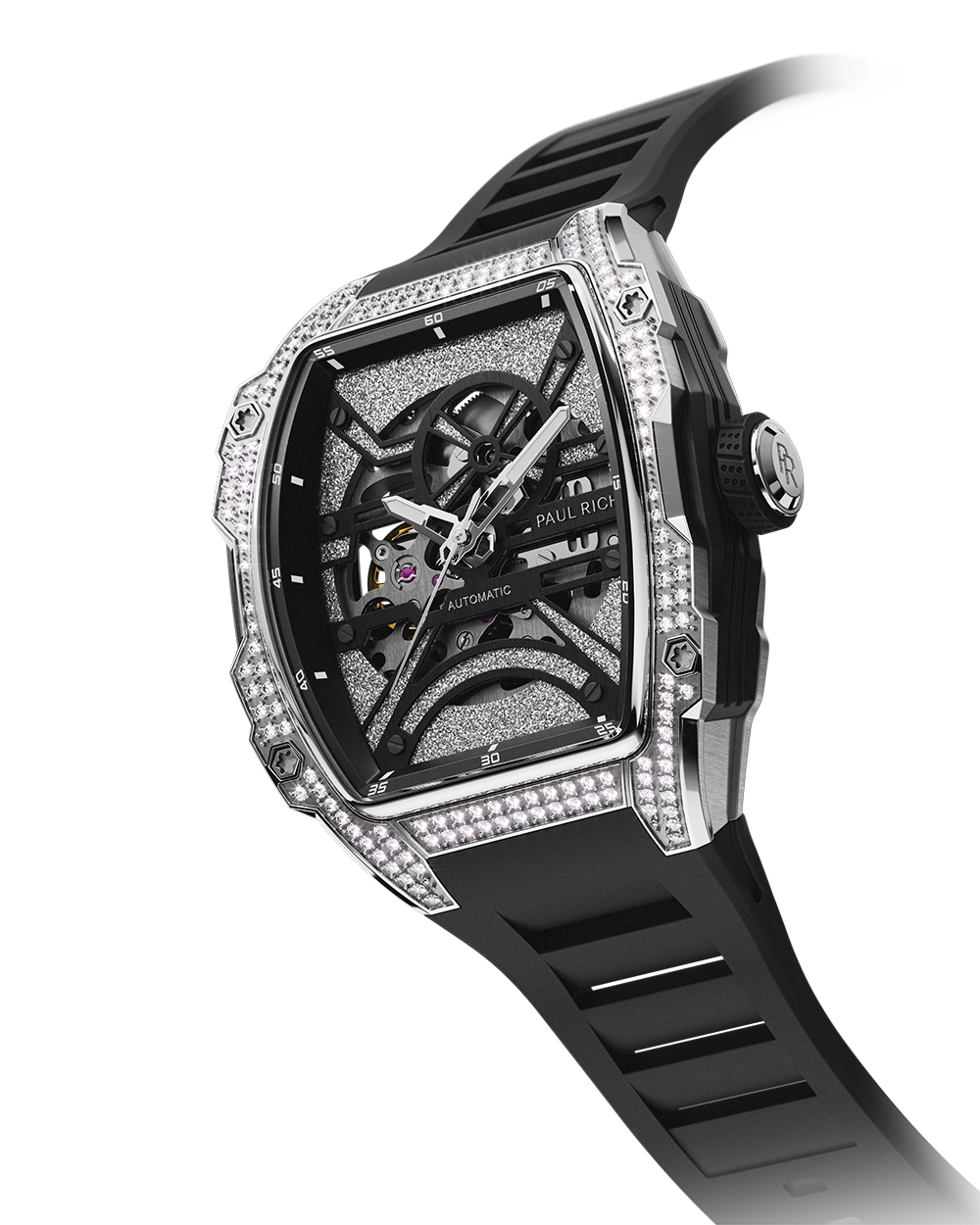 Angled view of a tonneau-shaped wristwatch with a skeleton dial, crystal-set bezel, textured metallic baseplate, and black rubber strap on a transparent background.