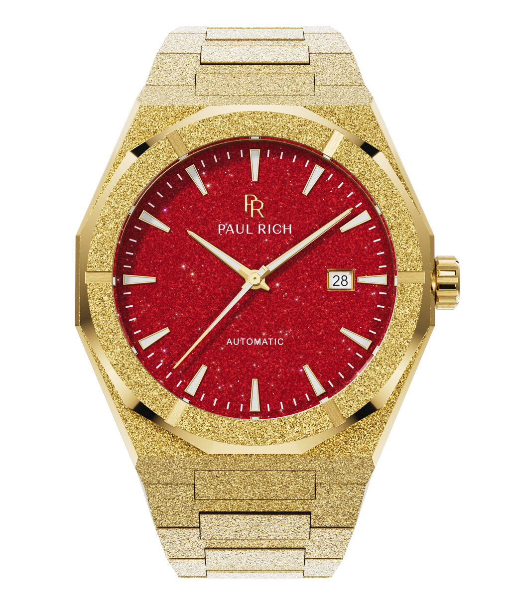 Gold frosted watch with red aventurine dial, gold hands and markers, date window at 3 o'clock, Paul Rich logo at center.