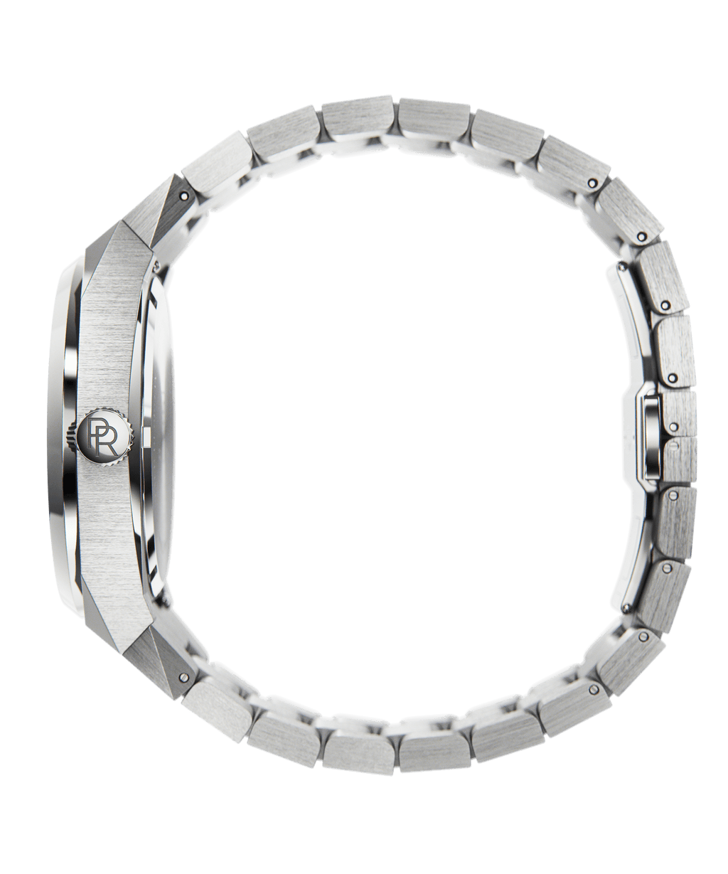 Side view of Paul Rich silver stainless steel watch with brushed case, PR monogram crown, and closed link bracelet on transparent background.