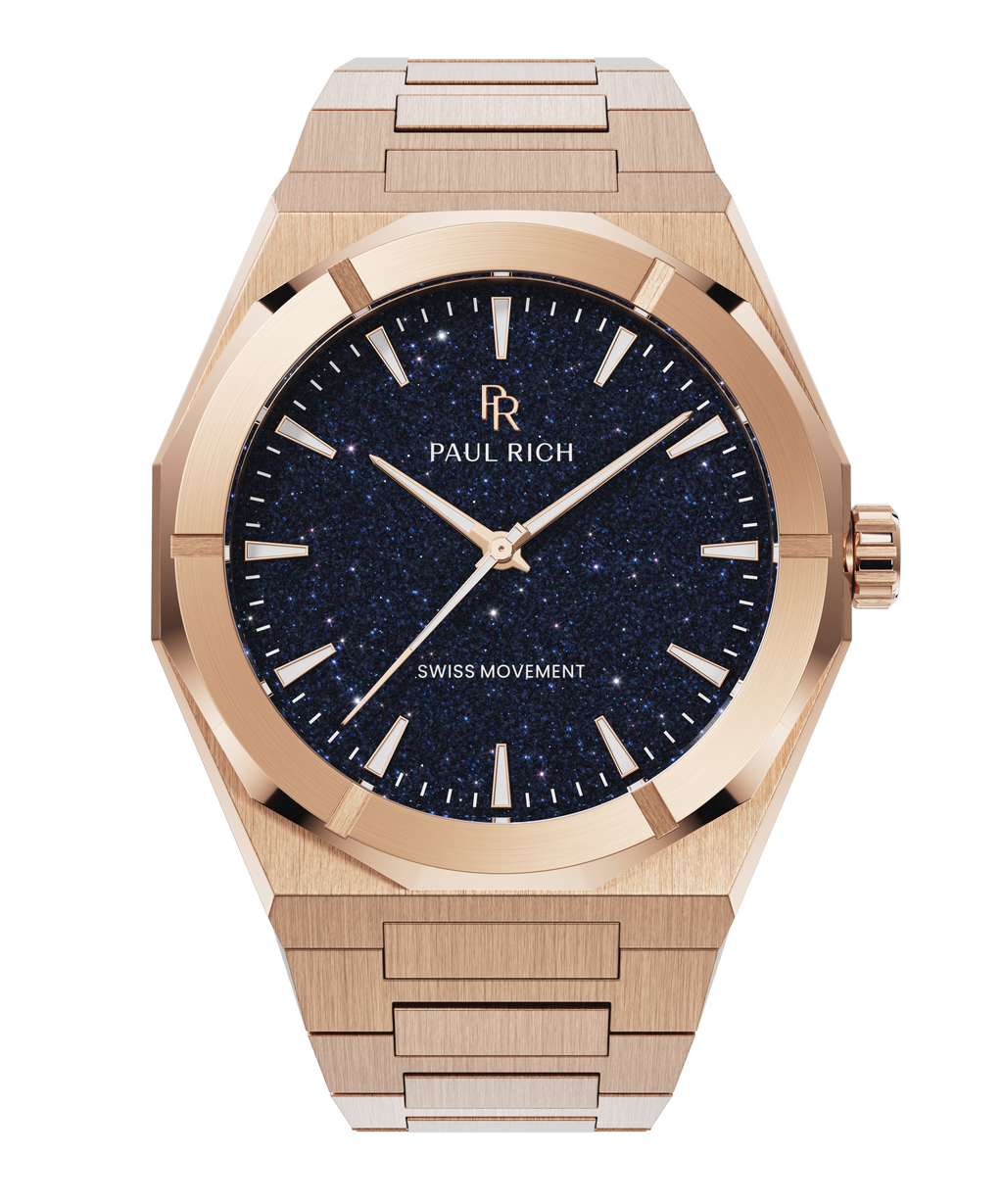 Rose gold Paul Rich watch with a deep blue aventurine dial, shown on a transparent background with brushed metal case and bracelet.